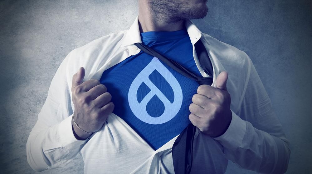 Man with Drupal logo on shirt
